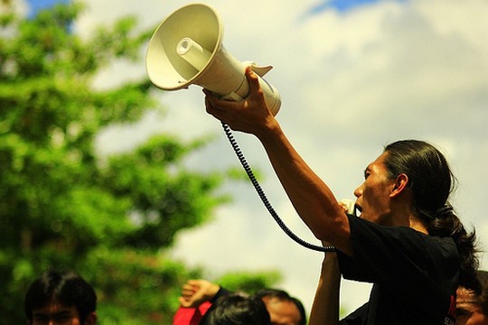 An activist at a protest in Yogyakarta in March 2012. Does social media replace the megaphone for activists in Indonesia today? / Vito Adriono New social media as a tool for activism